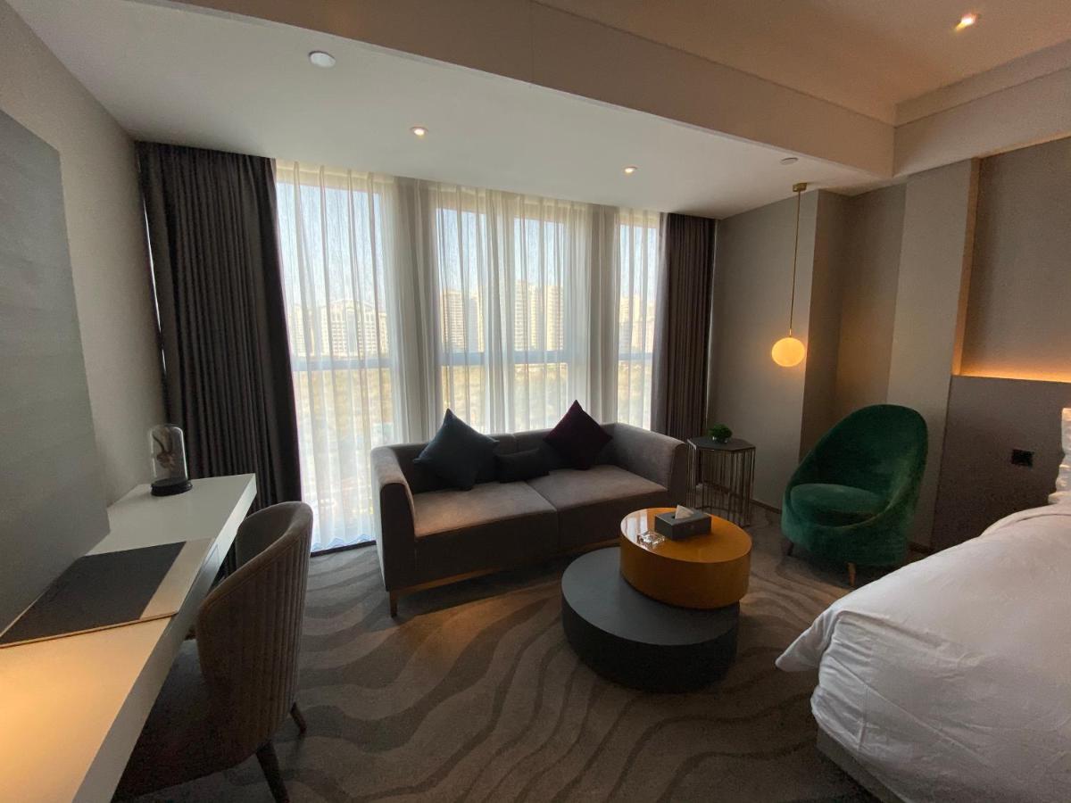 Ximala Business Hotel Guangzhou Exterior foto